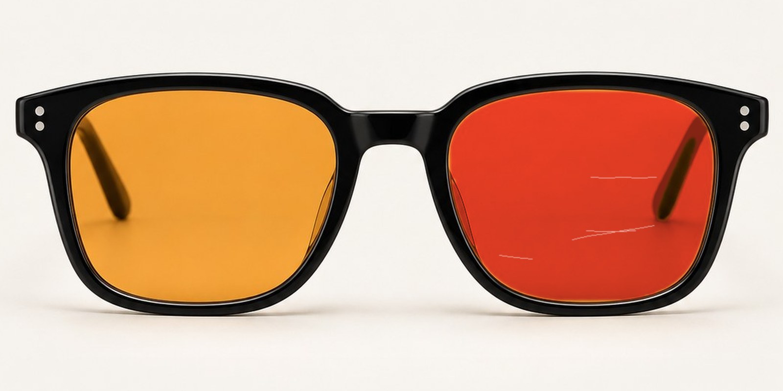 Noctis lens next to a cheap orange tint